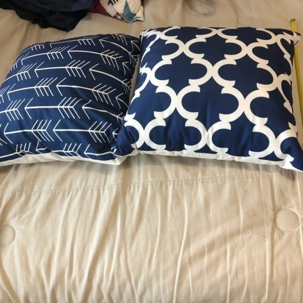 Navy and White Patterned Throw Pillows